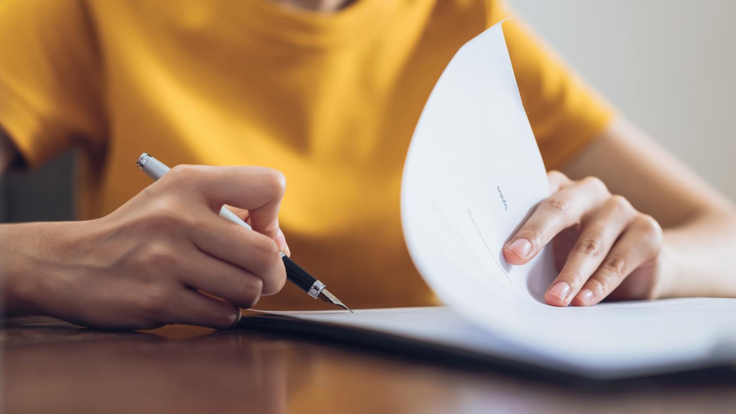 Woman filling out paperwork